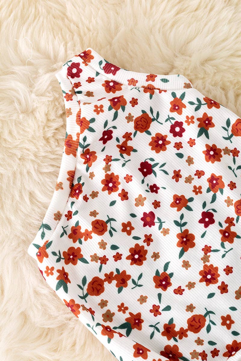Cold shoulder ditsy floral bodysuit with snaps. RPG50974 AMY: 2T